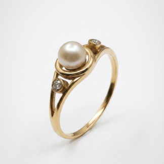 Anillo oro 18k perla y diamantes