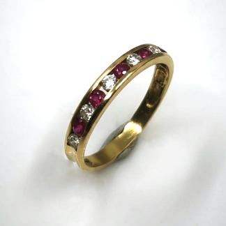 Anillo oro 18k rubíes y circonitas