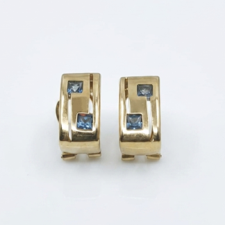 Pendientes oro 18k con topacios azules frente
