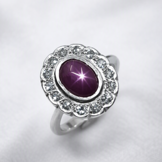 Anillo oro 18k rubí estrella y brillantes