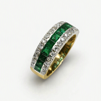 Anillo de oro 18k con esmeraldas y brillantes