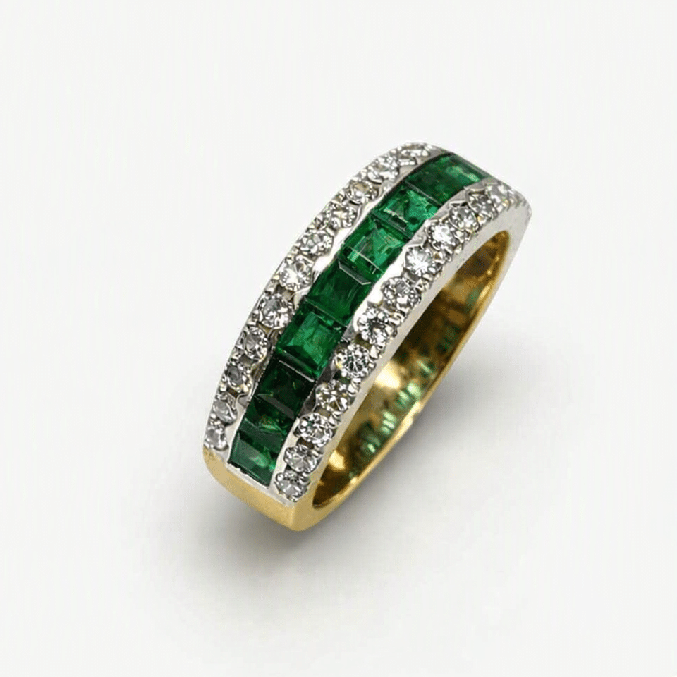 Anillo de oro 18k con esmeraldas y brillantes